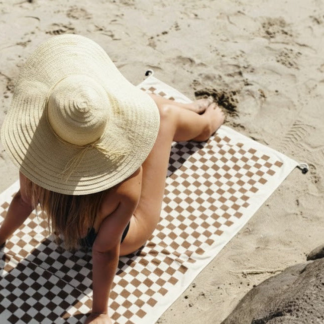 A classic checkerboard pattern composed of evenly spaced squares, creating a clean, orderly, and visually striking geometric design.