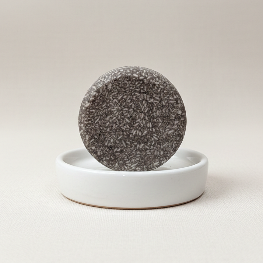 Keep hair soft and manageable wherever you go with this argan oil travel shampoo bar. The nourishing formula supports healthy hair while being compact, sulfate-free, and perfect for all hair types.